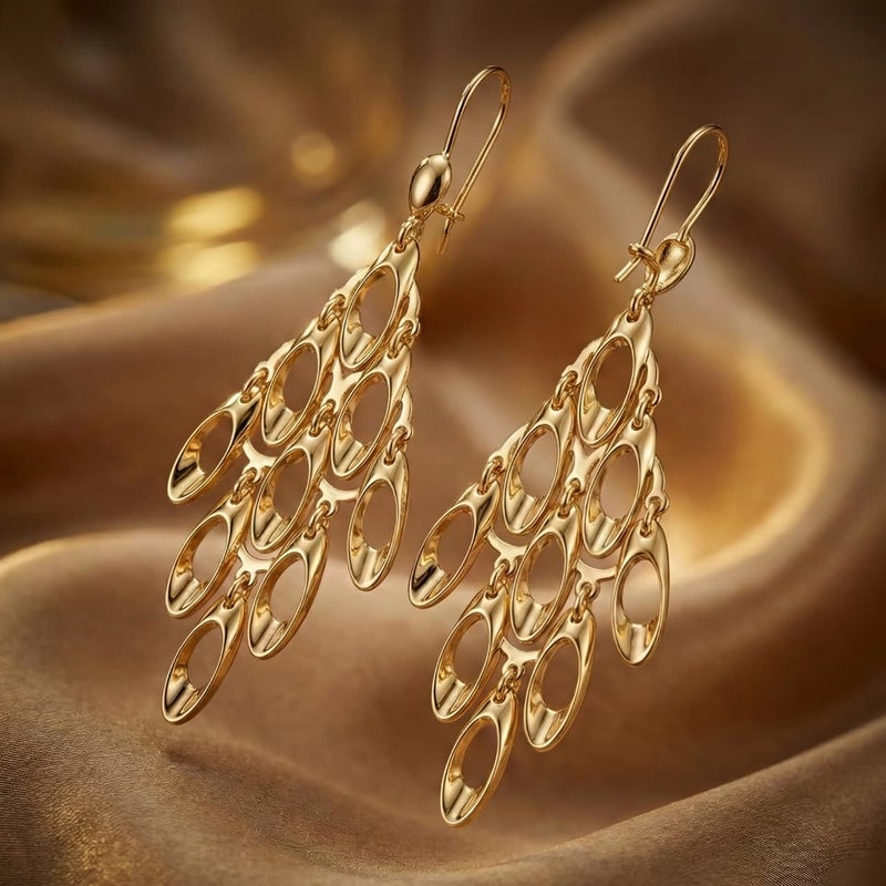 Long gold earrings with a geometric, openwork design, featuring movable charms that sway with your movements, creating a captivating sparkle. A luxurious and modern piece that will turn heads. - Image 5